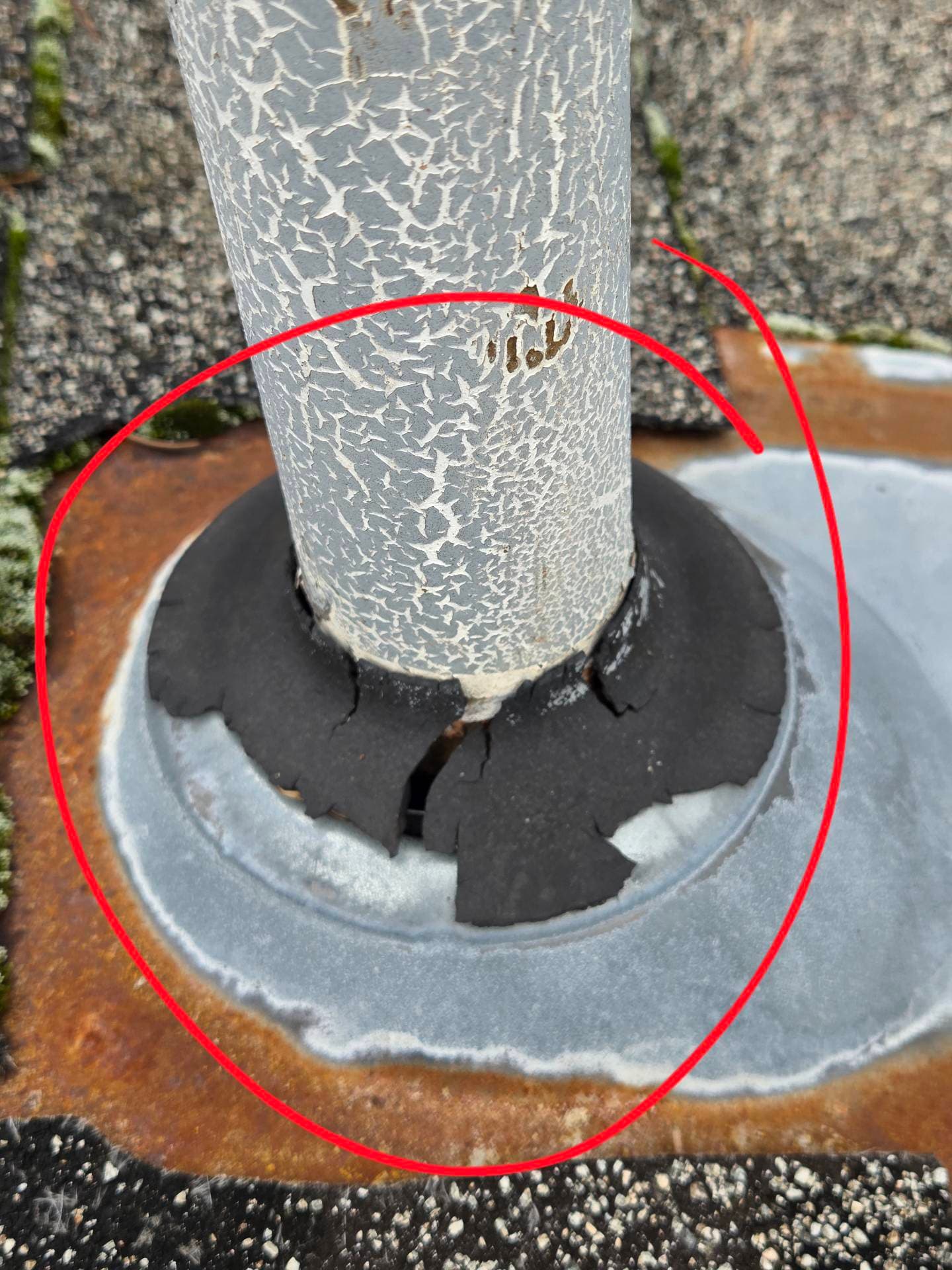 Real roof inspection finding: cracked and deteriorated rubber boot collar around a plumbing vent pipe on a Clark County WA home