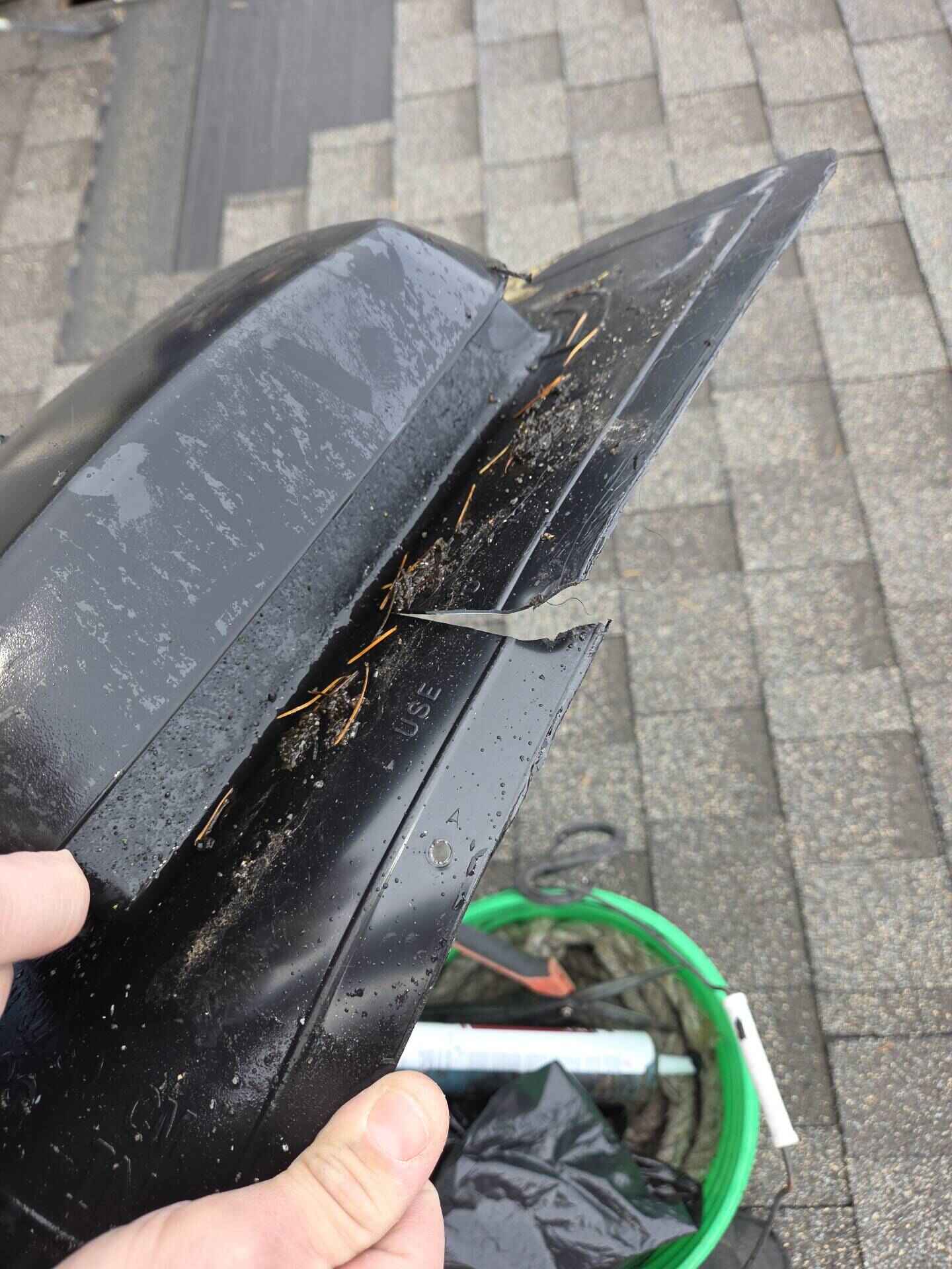 Real roof maintenance finding: cracked and failed rubber vent boot removed from a Vancouver WA roof during a maintenance visit