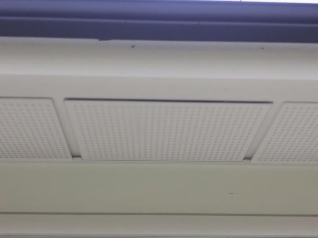 Roof showing soffit vents under eaves and ridge vent along peak