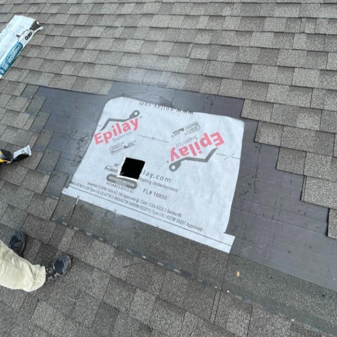 Small roof leak damage spreading across ceiling