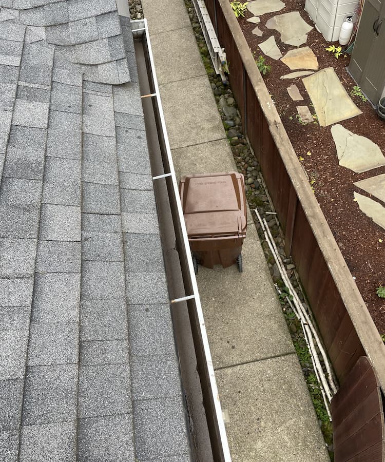 Freshly cleaned gutter system ready for winter