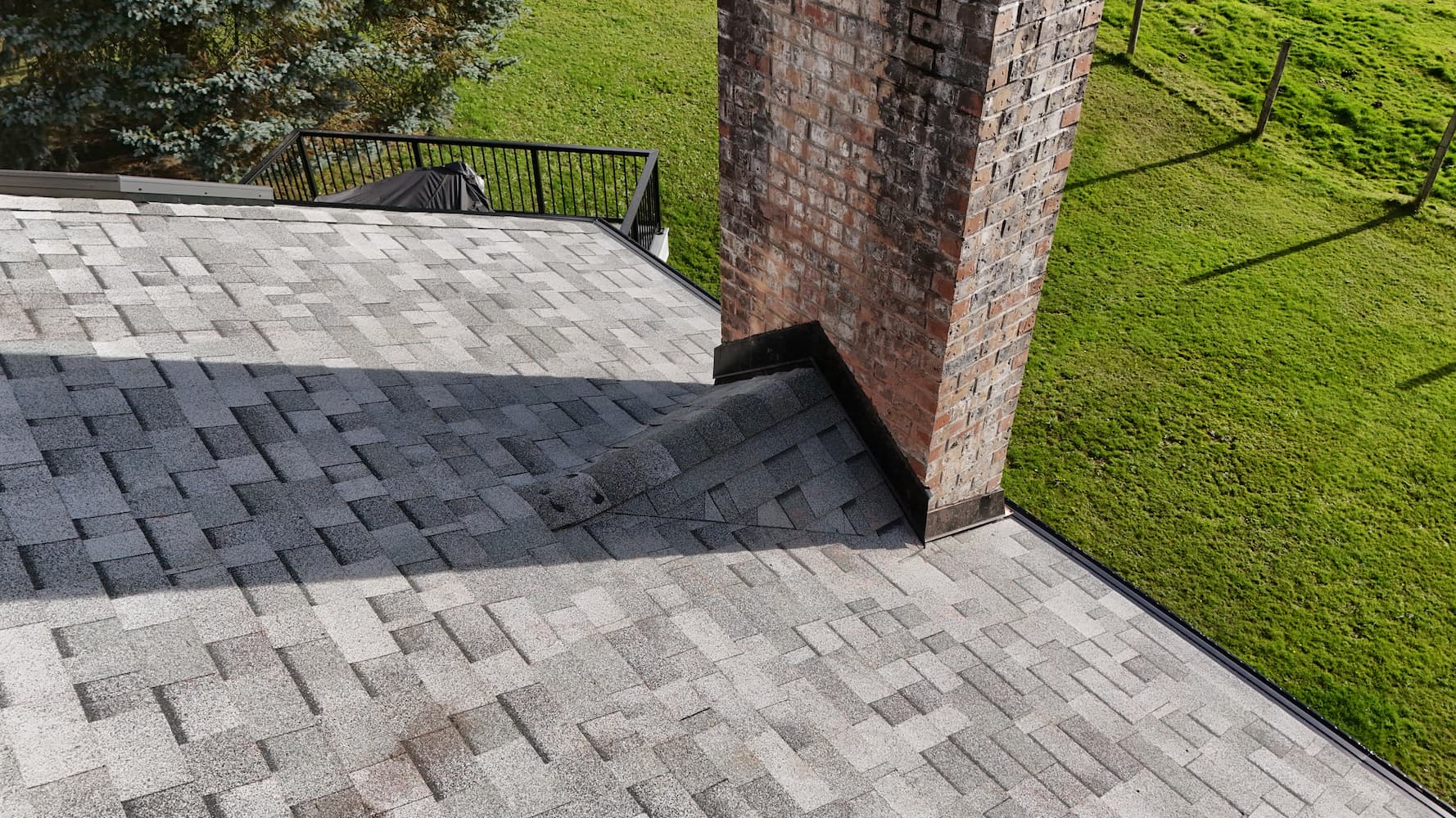 New roof cricket installation for proper drainage