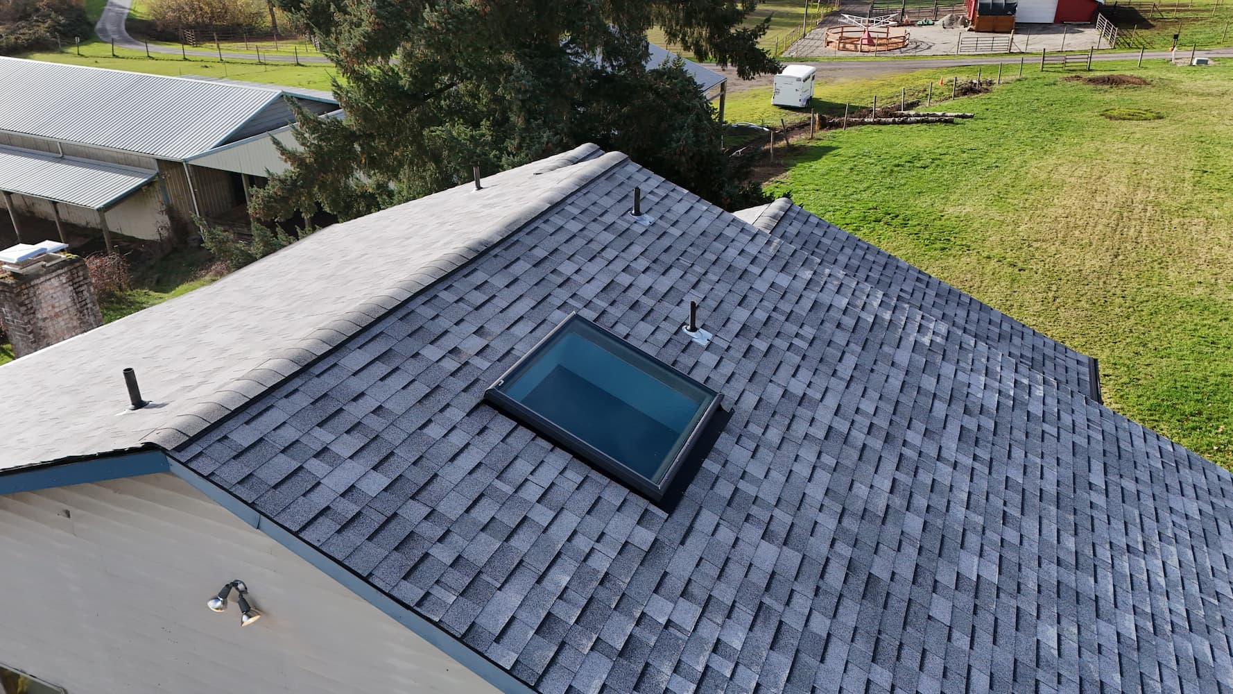 Skylight waterproofing detail on asphalt roof